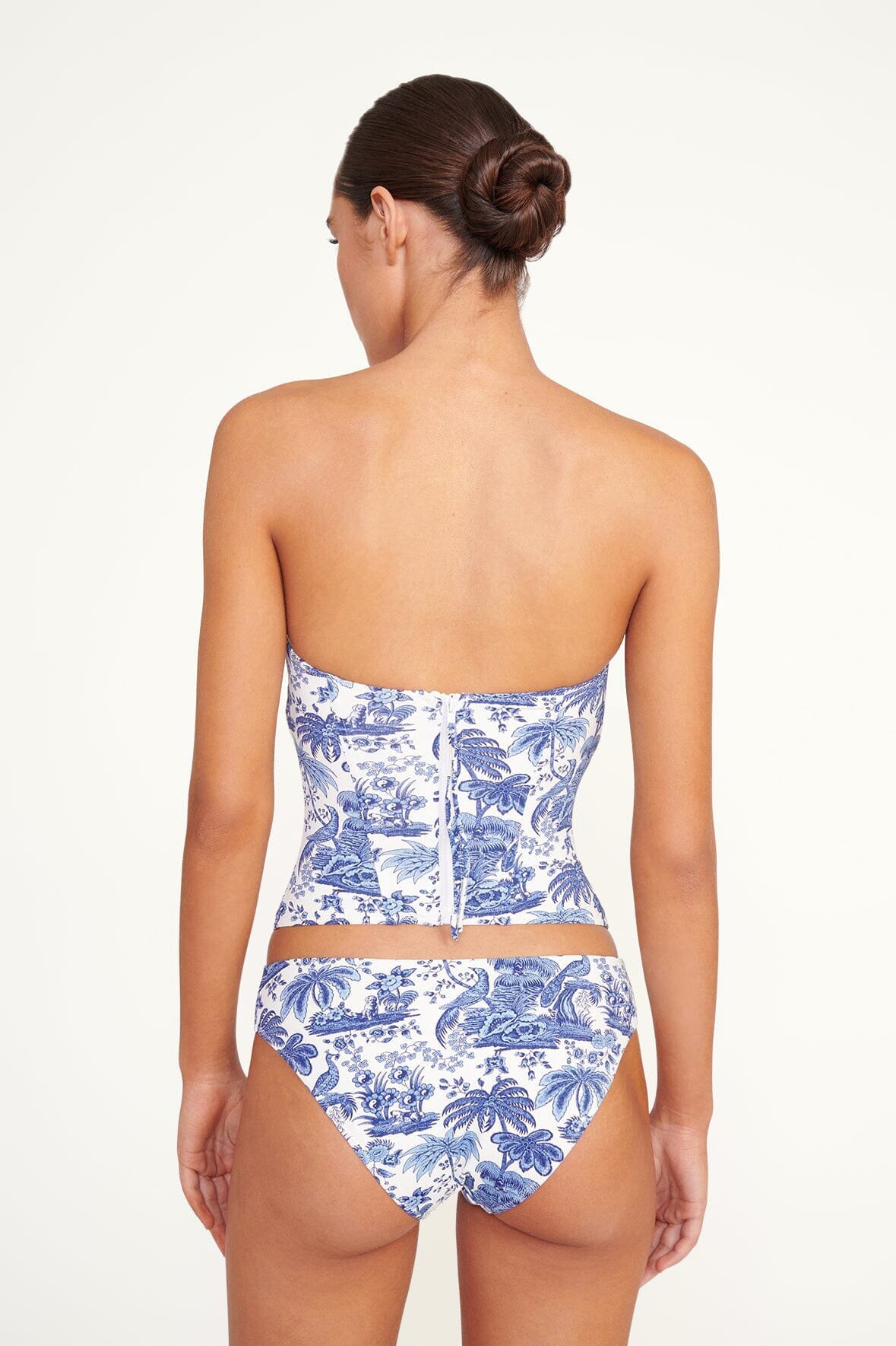 Blue toile strapless bandeau bikini top back view on model, fitted straight panel