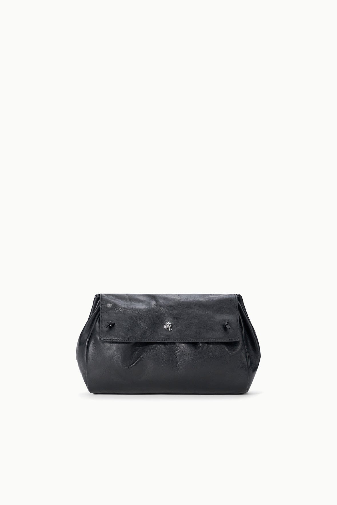 Black convertible bag with flat top flap and magnetic clasp, front view
