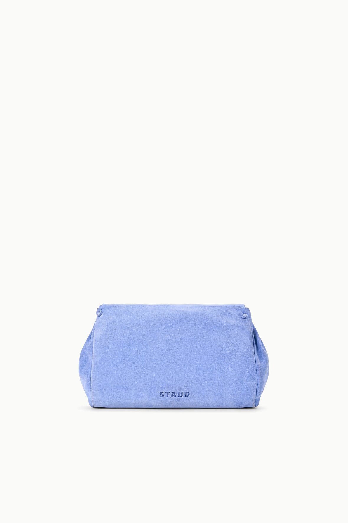 Light blue convertible bag side view with 'STAUD' logo patch