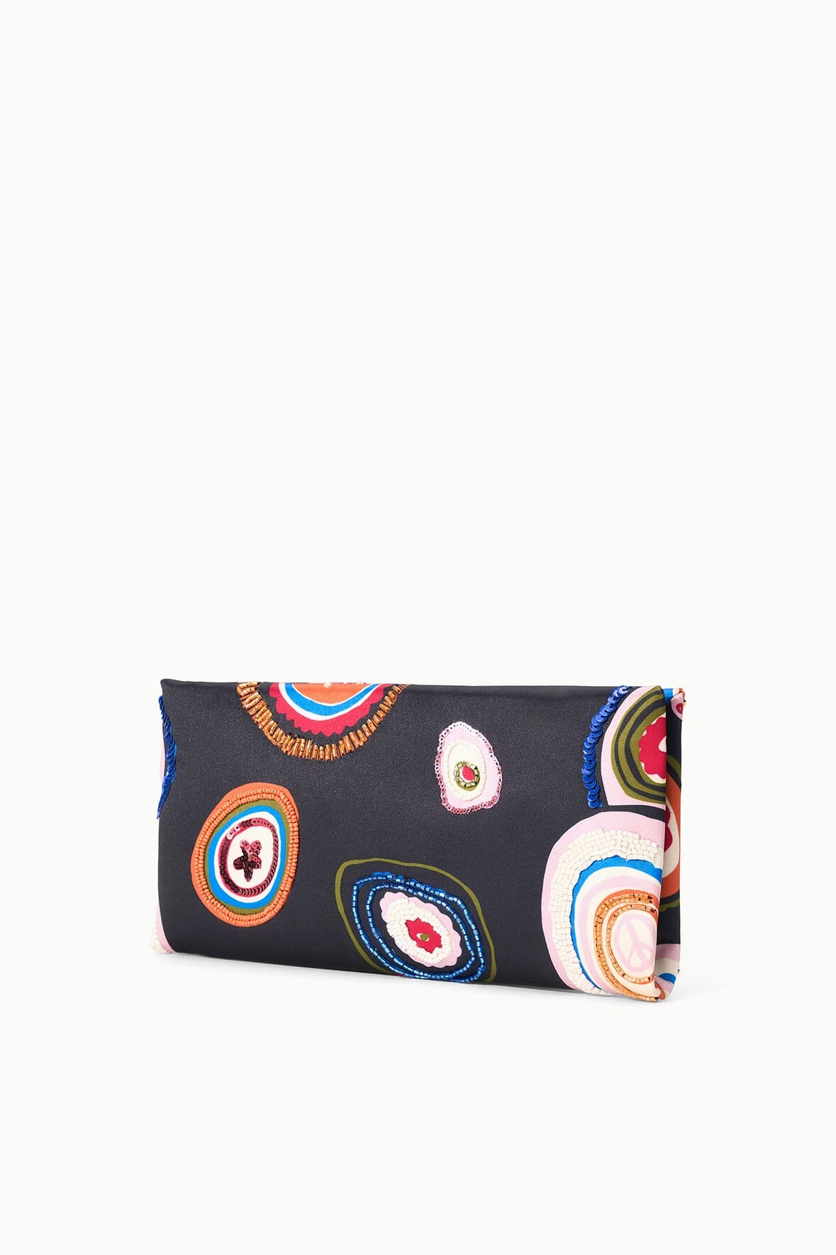 Black clutch with colorful paisley print and visible side fold seam.