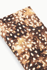 Close-up of fawn haircalf clutch fabric with brown and tan speckled spots