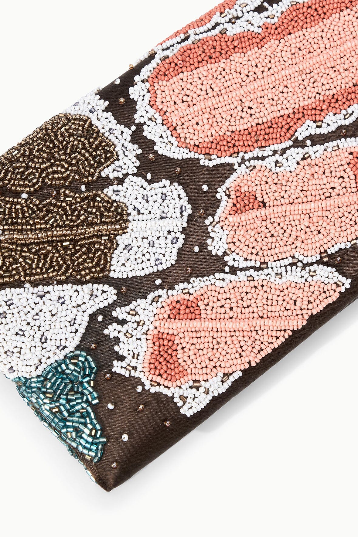 MUSE clutch close-up: brown base with peach, white, and teal beaded butterfly design