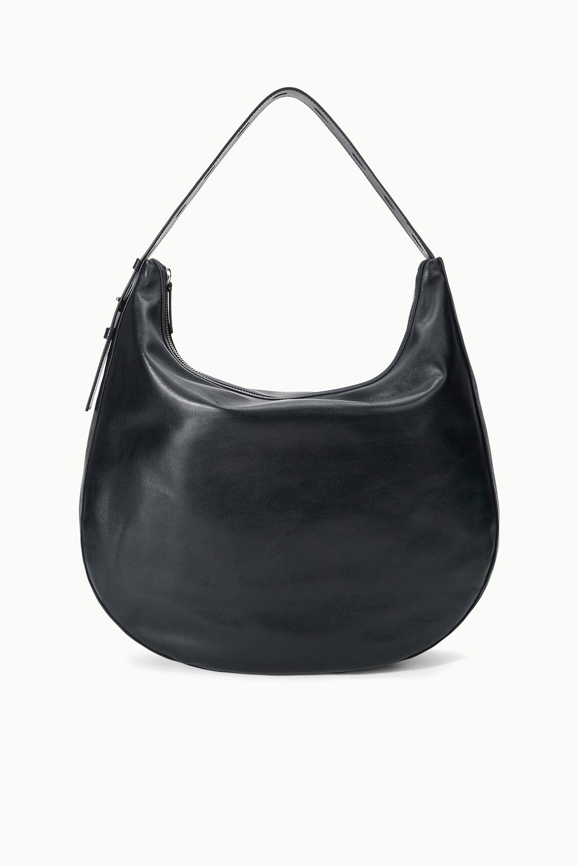 Black hobo bag with curved top handles and side zip pull tabs