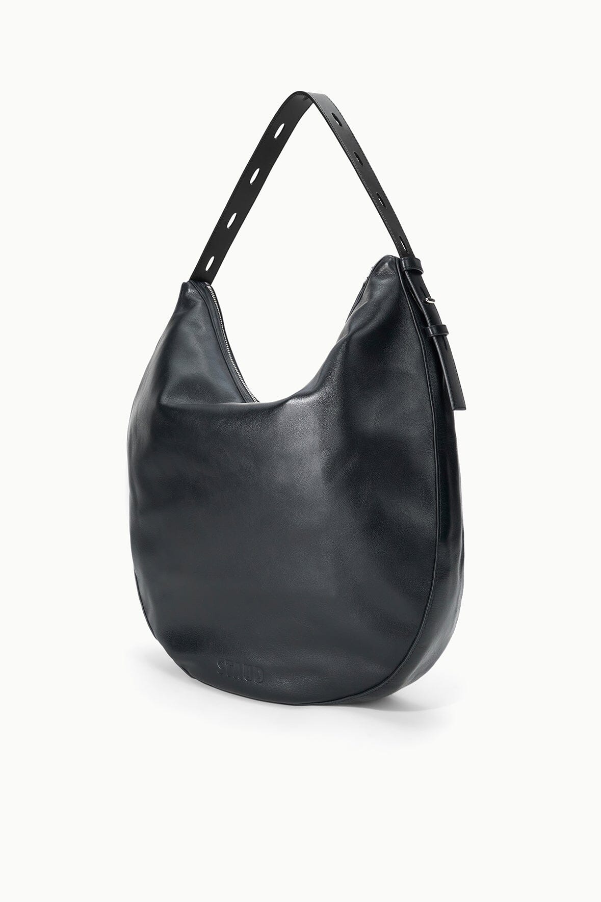 Black hobo bag angled view with top handles and side zip detail