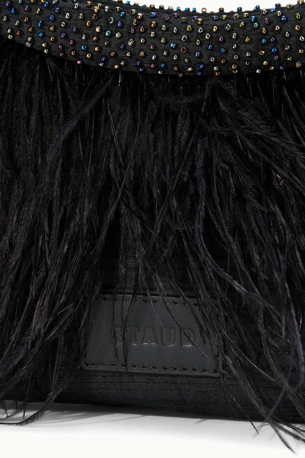 Black fringed handbag with jeweled bead band and leather logo patch