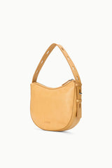 Levi cashew hobo bag angled side view with zip pocket detail