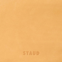 Levi cashew bag close-up of bottom logo stamp: STAUD