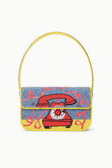 TOMMY beaded bag front view, yellow handle, red phone graphic on blue textured base.