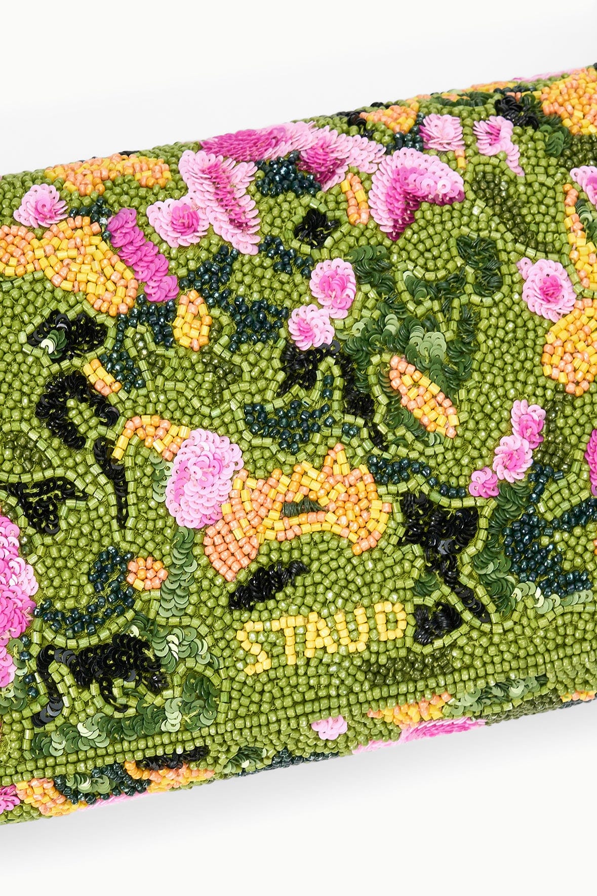 Green woodland floral beaded fabric panel with pink blossoms on the convertible shoulder bag