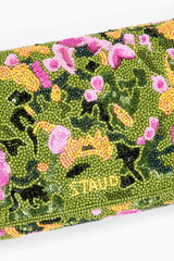 Green woodland floral beaded fabric panel with pink blossoms on the convertible shoulder bag