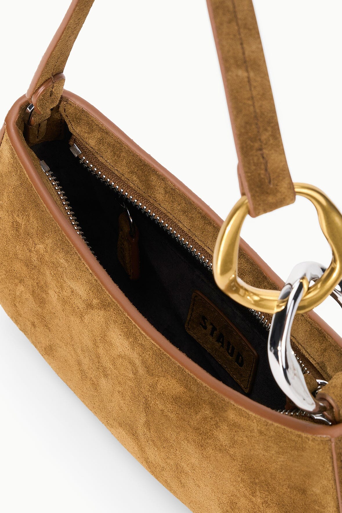 Cigar suede hobo bag interior with top zipper and stitched leather lining