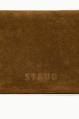 Brown suede shoulder bag with embossed logo on the front panel