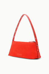 Red-orange shoulder bag with top handle, side detail, and logo on front