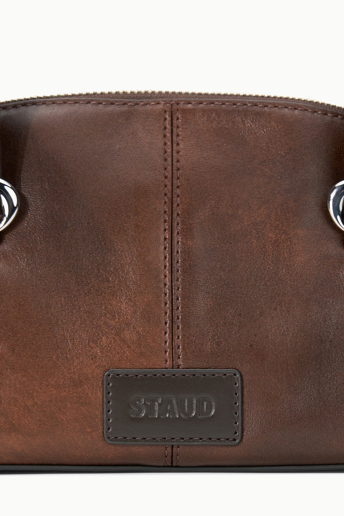 HESTER mini shoulder bag logo patch on distressed espresso brown leather panel