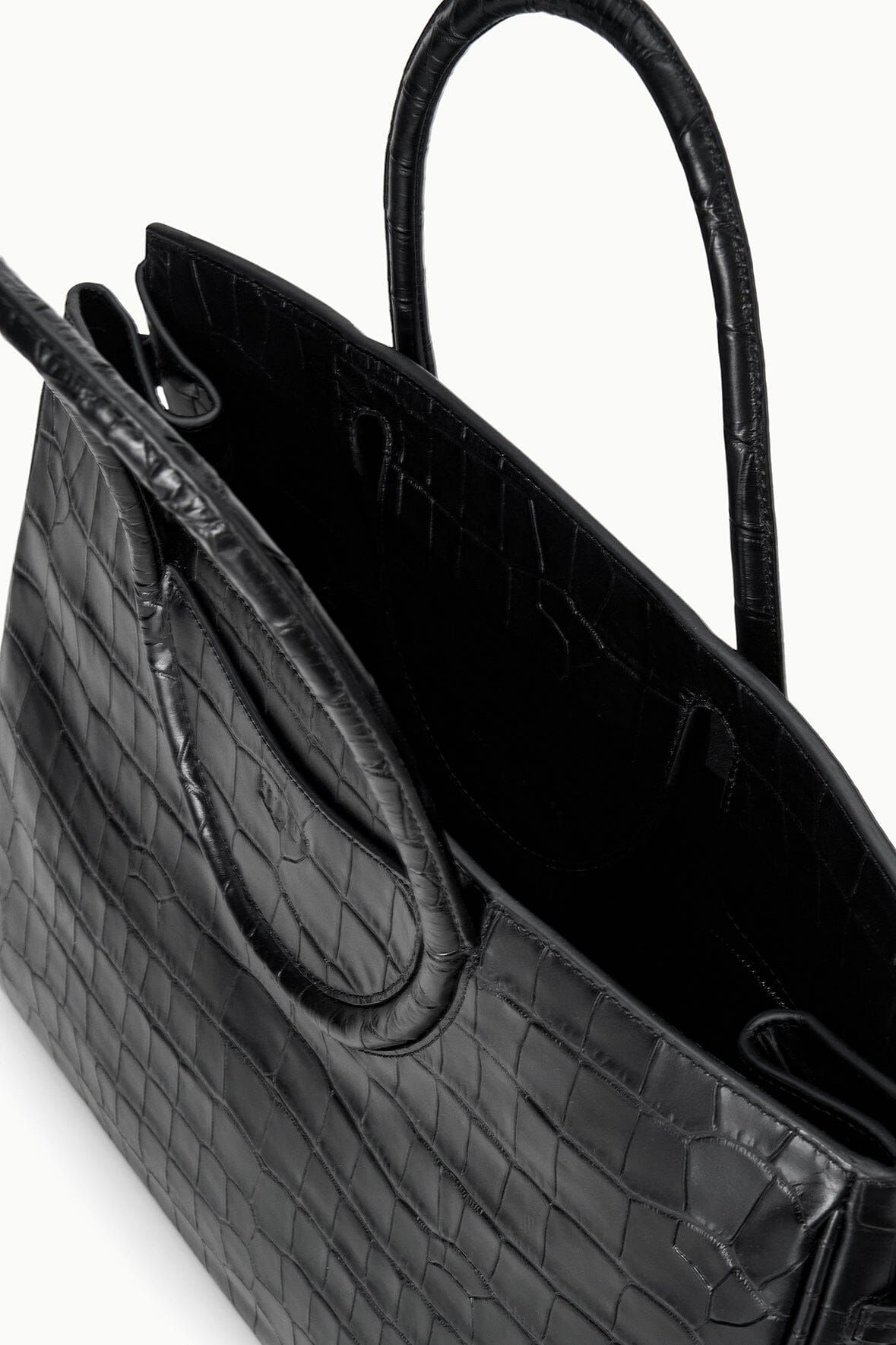 Black croc-embossed carryall bag open view showing interior and side pocket