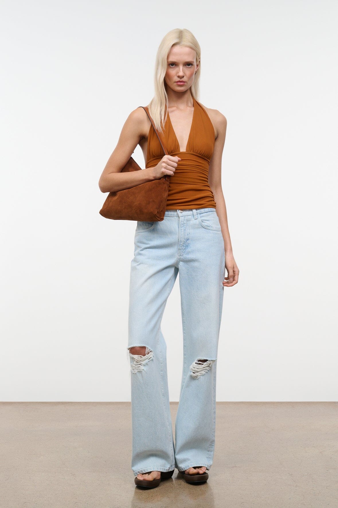 Tabac suede shoulder bag with slouchy hobo shape and short handles
