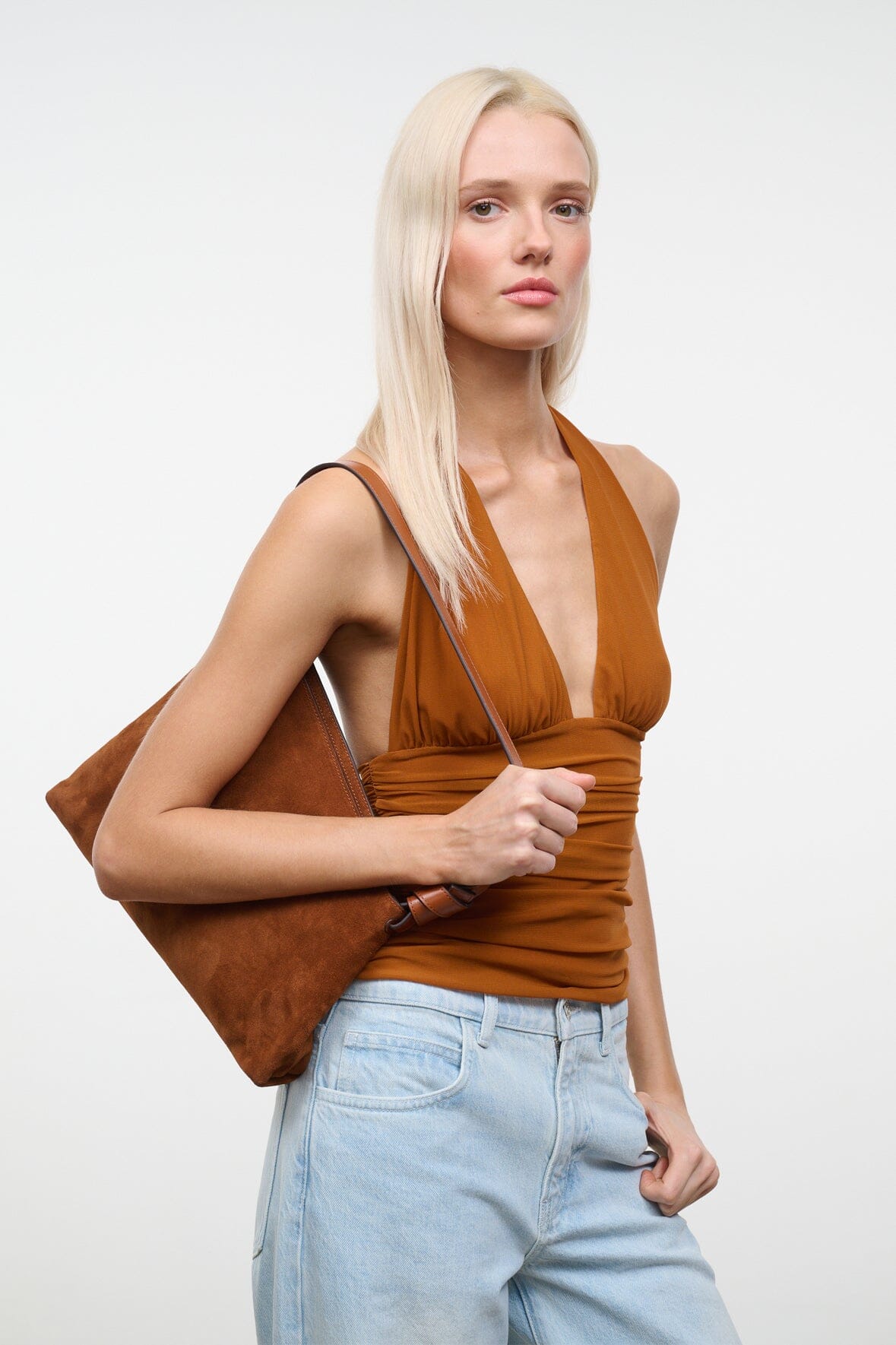 Tabac suede shoulder bag with adjustable leather strap and slouchy shape