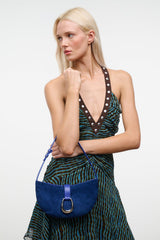 Cobalt crescent suede shoulder bag with ring buckle on adjustable shoulder strap