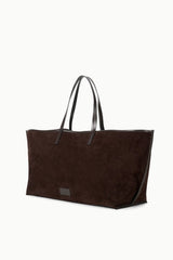 Brown suede large tote bag with two handles and front logo patch