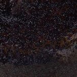 Textured dark ceramic surface detail