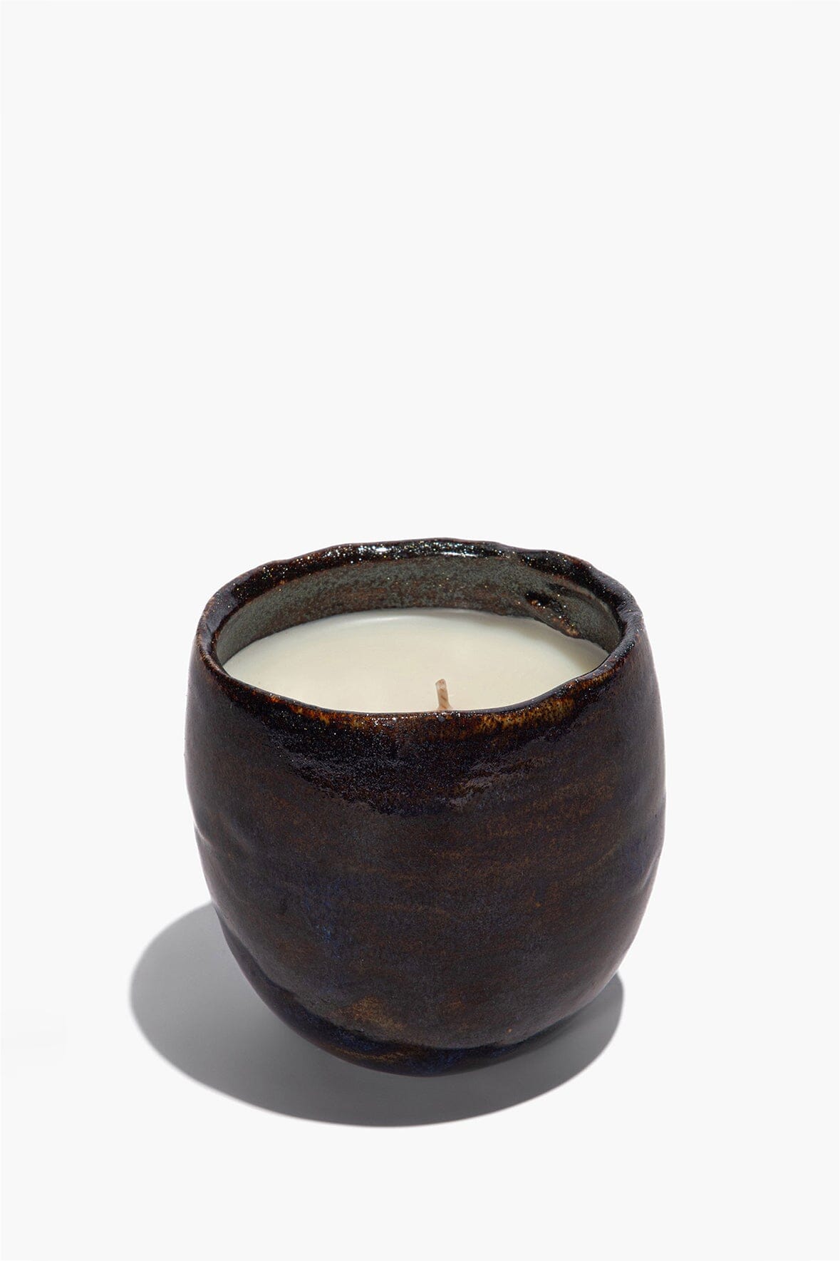 Dark ceramic candle with cream wax and small wick