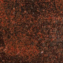 Burnt sienna glaze texture on square ceramic coaster with dark speckled finish