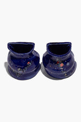 Pair of dark blue ceramic vase bookends, speckled polka-dot finish