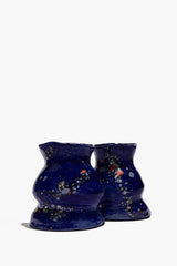 Ceramic vase bookends in dark blue with speckled polka-dot glaze