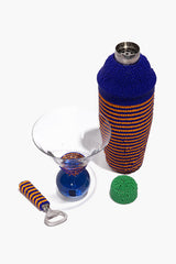 Beaded martini bar set with beaded shaker bottle, two glasses, beaded accessory, and opener