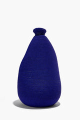 Blue hand-beaded vase with tapered sides and rounded base