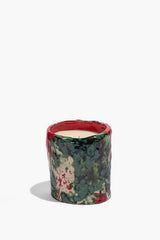 Ceramic candle with red rim and green-blue speckled ceramic body