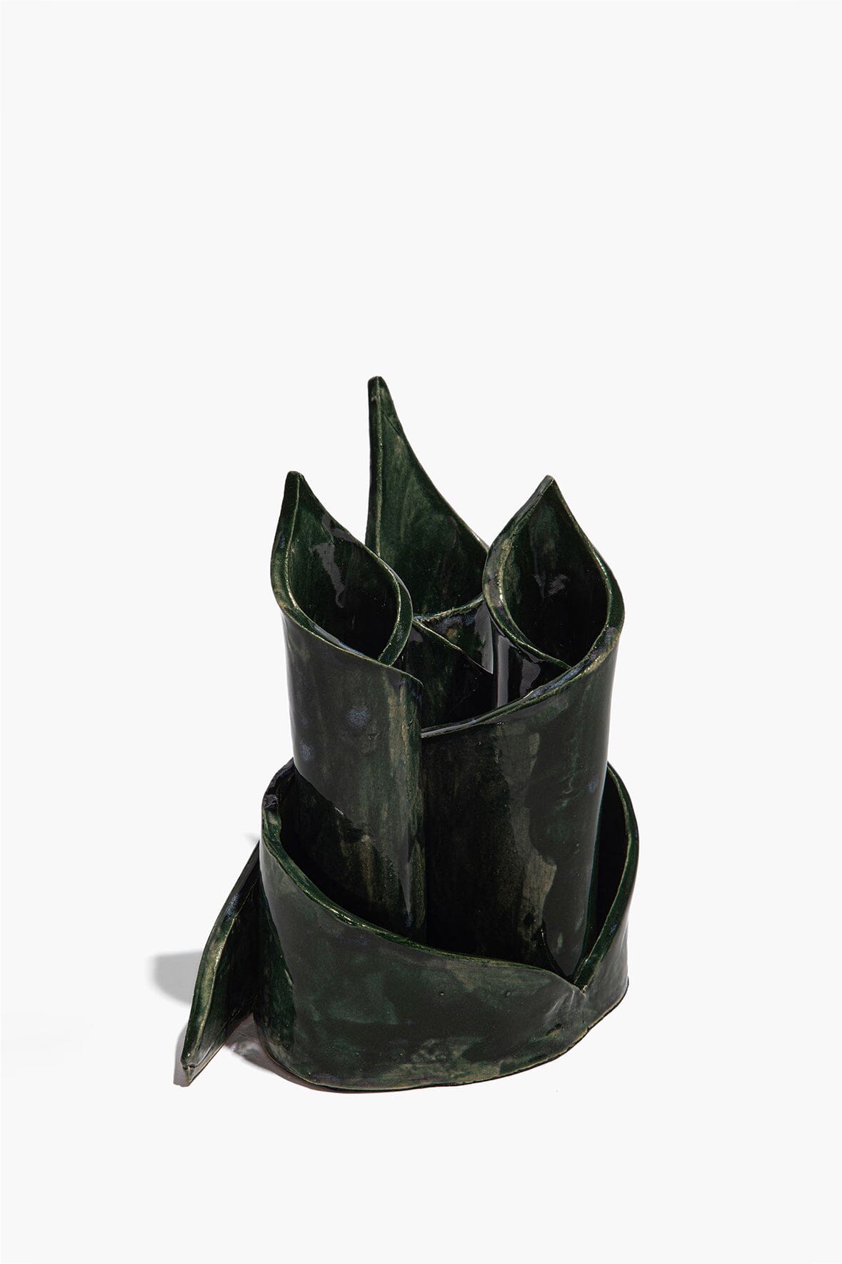 Ceramic triple candlestick holder with three pointed candle cups, forest-green glaze finish