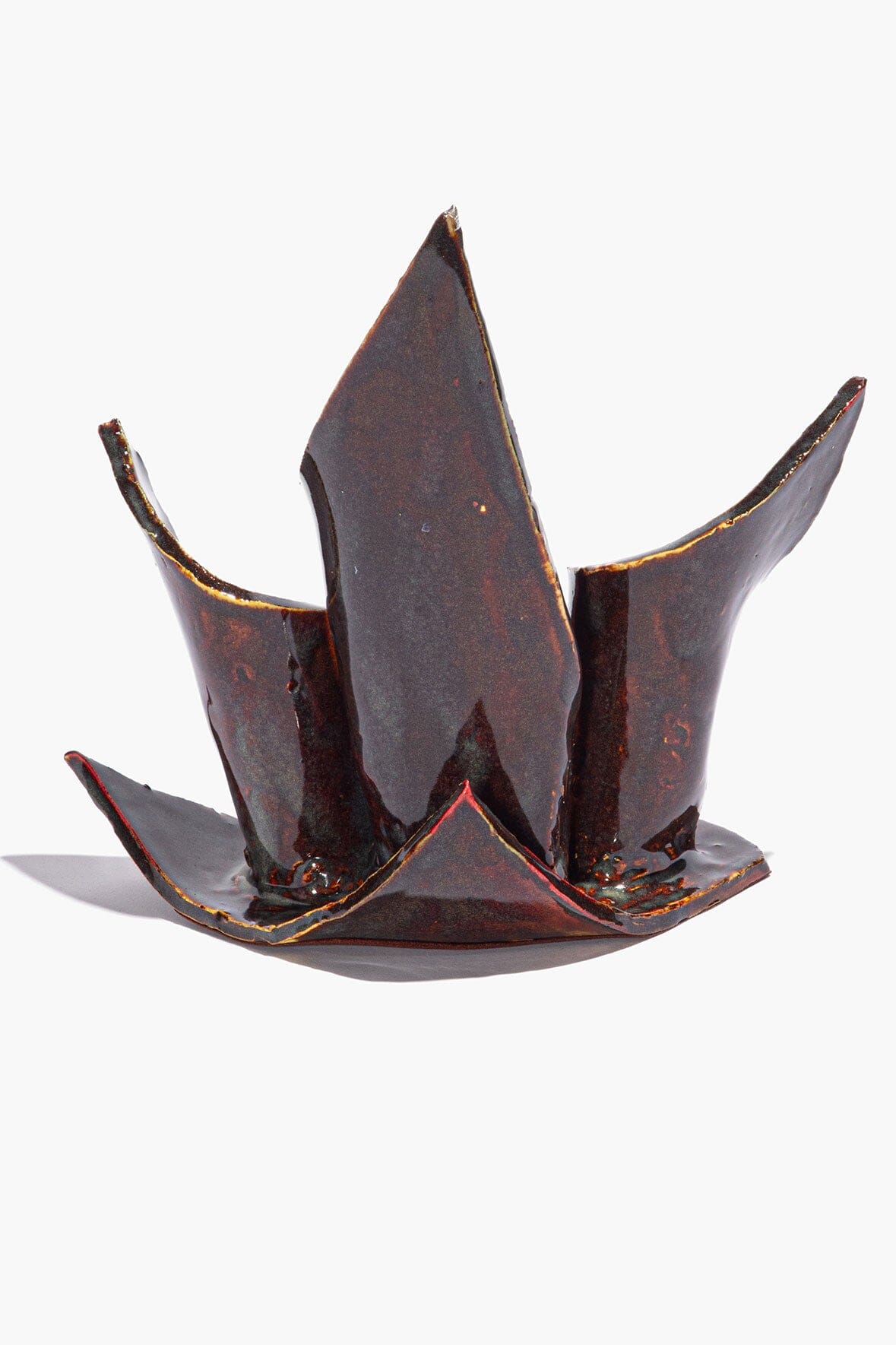Ceramic triple candleholder with maroon wash glaze and three fluted, leaf-like candle cups