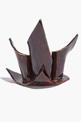 Ceramic triple candleholder with maroon wash glaze and three fluted, leaf-like candle cups