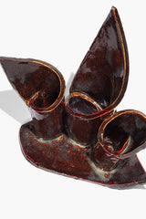 Ceramic triple candleholder, maroon wash glaze with three rounded candle openings and drip rim