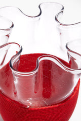 Red beaded vase with wavy clear glass rim