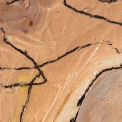 Crinkle glazed ceramic wall art detail, tan glaze with bold black outline marks