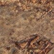 Close-up of organic rock candlestick holder texture with carved candle well