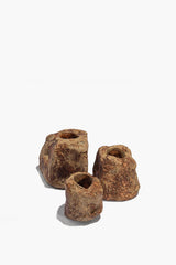 Organic rock candlestick set with three separate rough stone candle holders