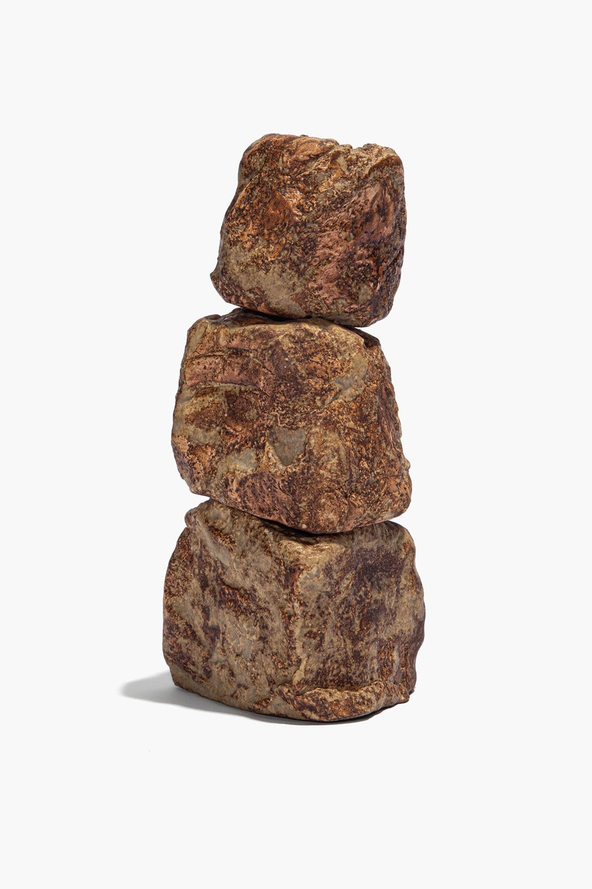 Organic rock candlestick set with three stacked rugged stone candle holders