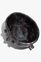 Large Henry bowl in dark glaze, sculpted rim and side knobs; inner blue sheen visible.