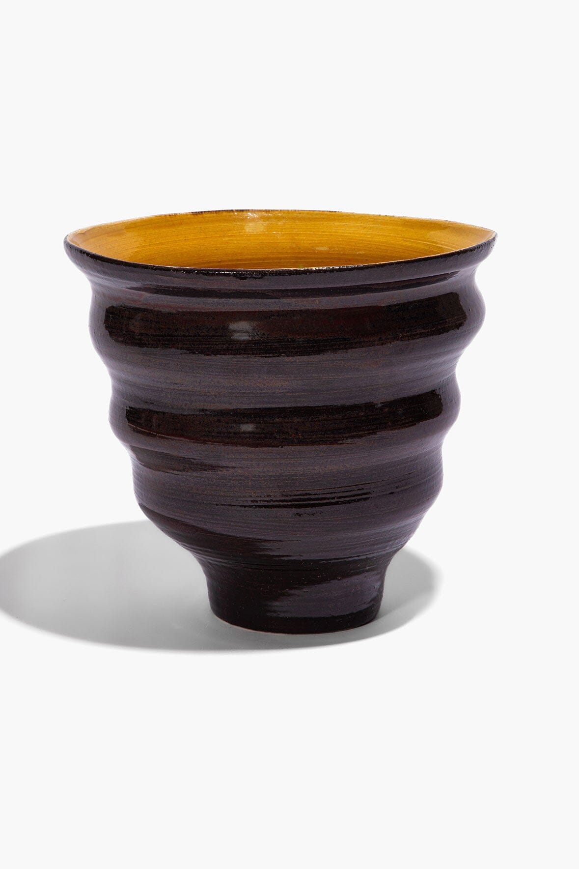 Stacked cone vase, dark burgundy exterior with mustard interior, tapered silhouette