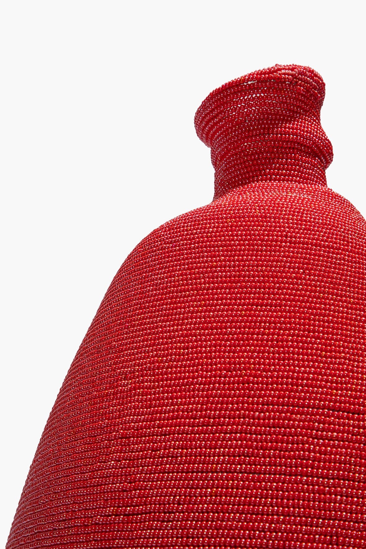 Tall red hand-beaded vase, close-up of beaded neck and shoulder texture