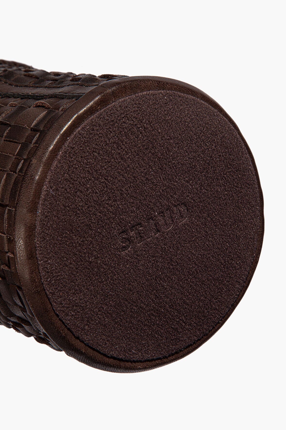 Espresso woven leather candle sleeve with embossed logo, circular base