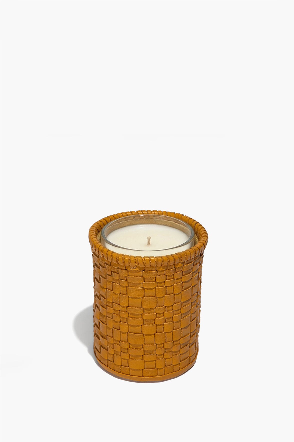 Round woven goldenrod leather candle holder with white candle and wick