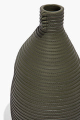 Moss wrapped vase, close-up of top opening with ribbed stitched collar