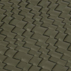 Olive-green woven leather placemat surface with square texture, close-up
