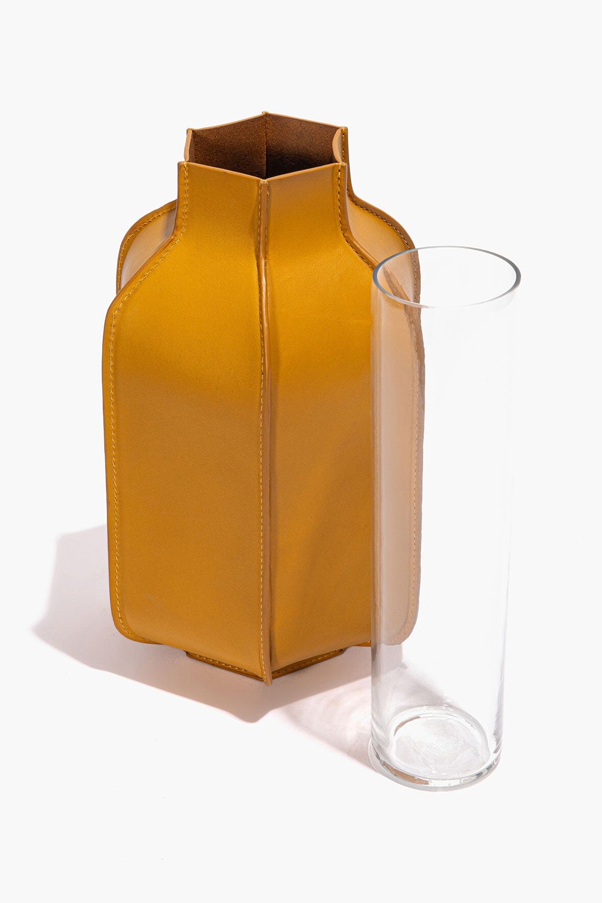 Goldenrod leather bottle vase with stitched sides and open top