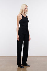 Black high-rise jeans side view with wide straight legs and front seam