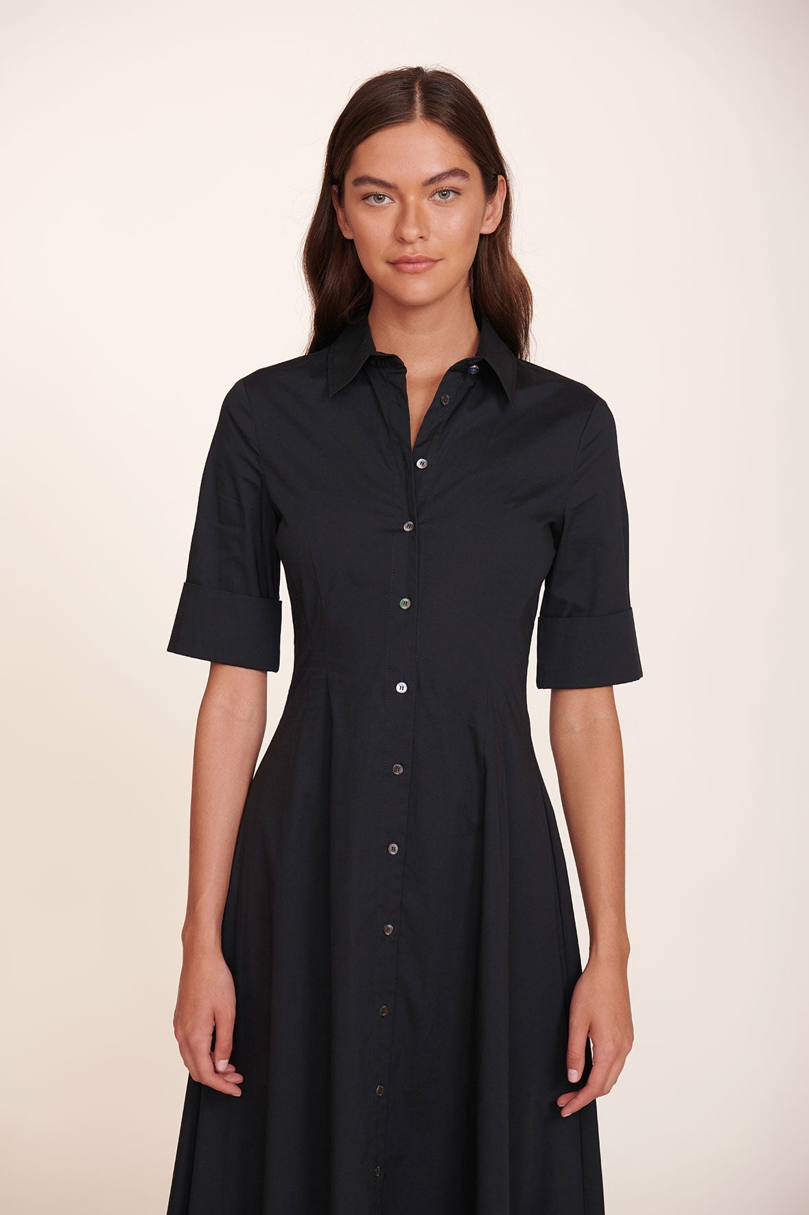 Black button-front maxi dress with pointed collar and short sleeves